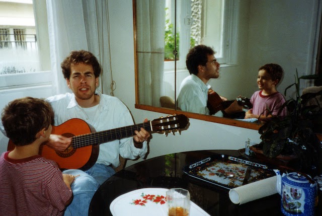 Young Dan with guitar
